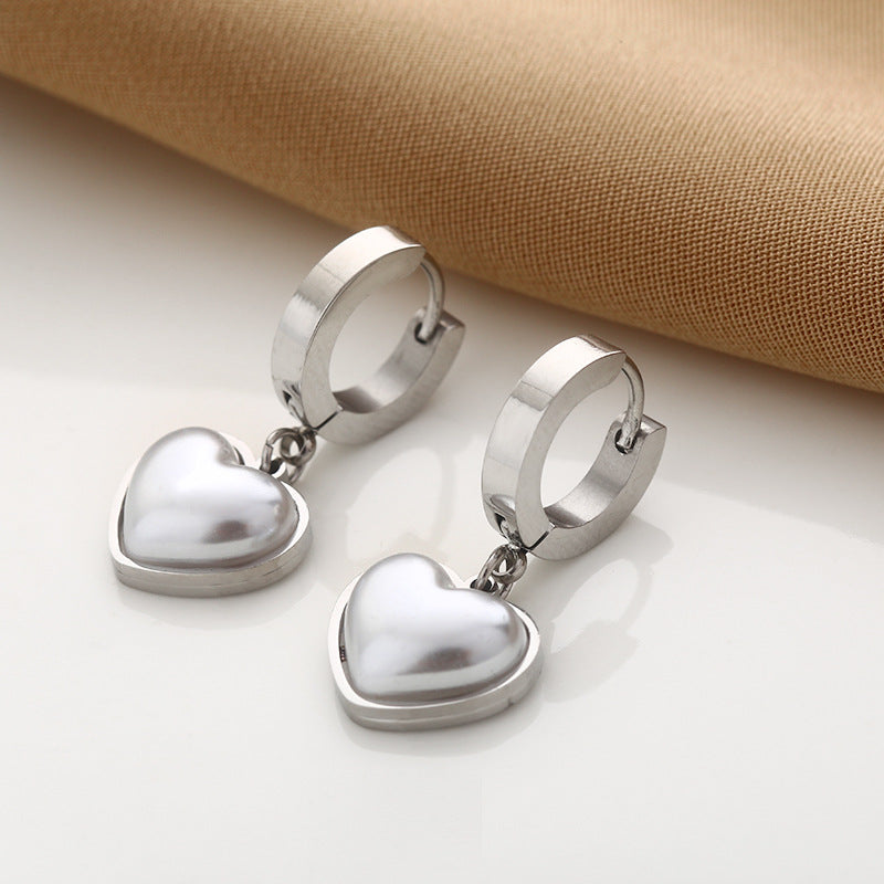 Aretes perlas corazón plateados para mujer