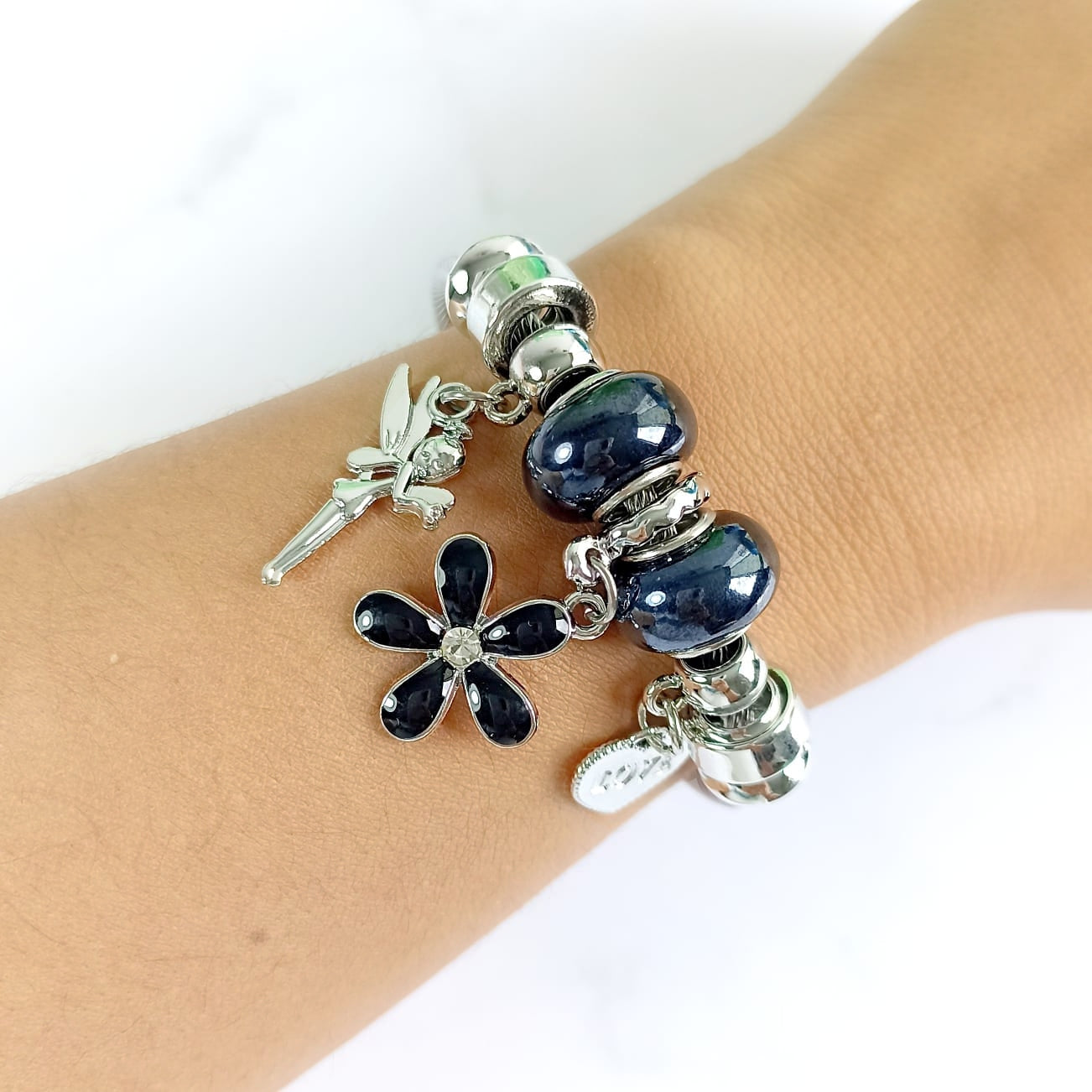 Pulsera plateada flor margarita para mujer