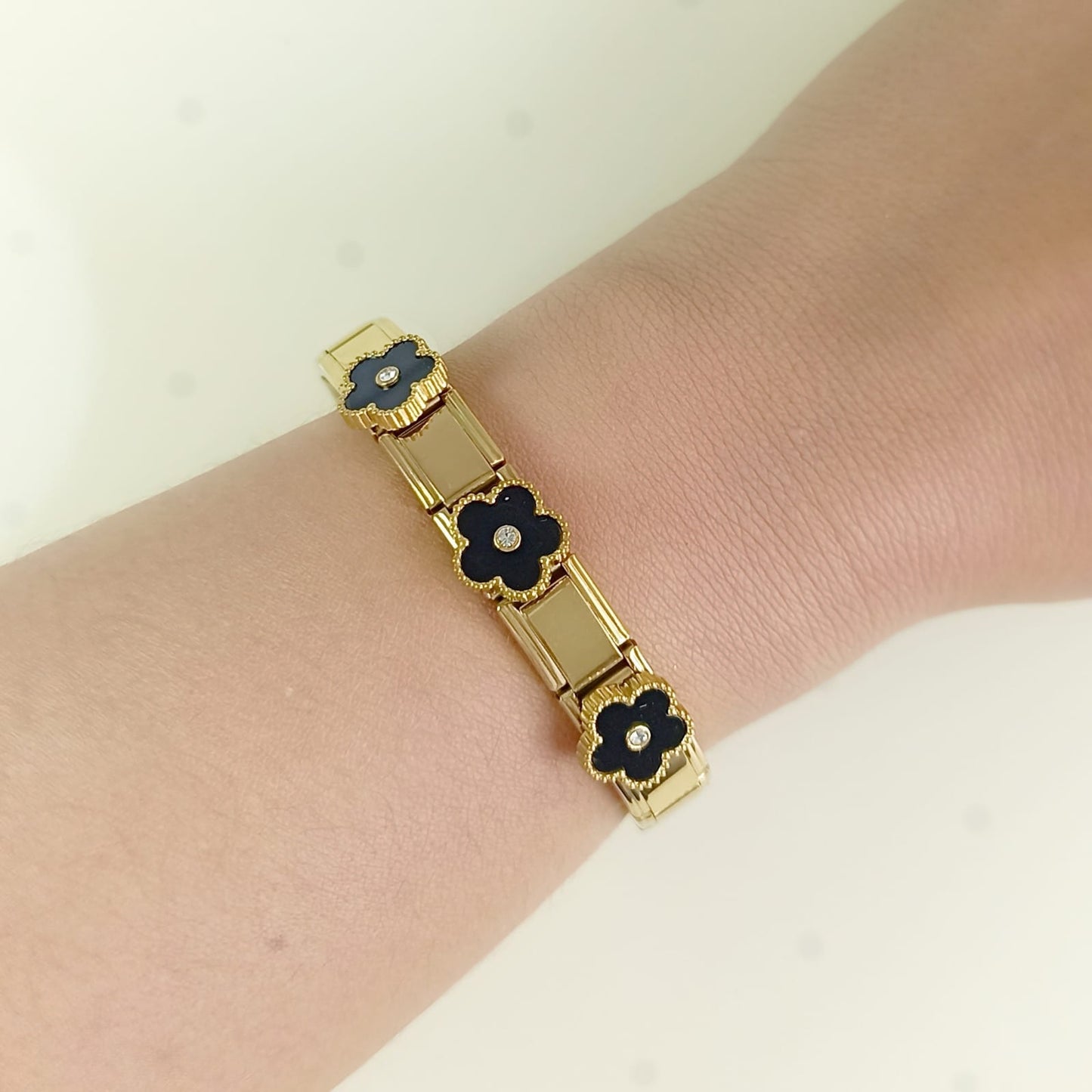 Pulsera flores dorada para mujer