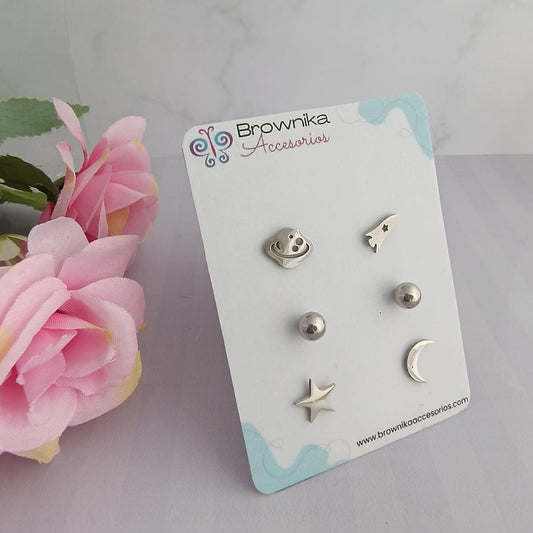 Set de aretes plateados en acero quirúrgico 316L para mujer –  cohete y planeta, estrella y luna y bolitas