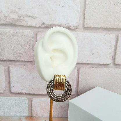 Aretes Rueda Dorado y Plateado Acero
