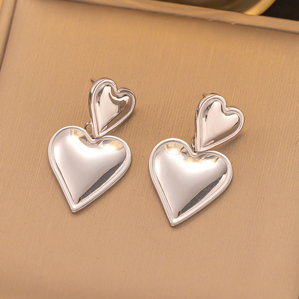 Aretes de corazones dobles modernos | Elegancia y estilo romántico