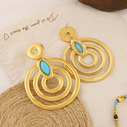 Maxiaretes Dorados Geométricos con piedra turquesa | Brownika Accesorios