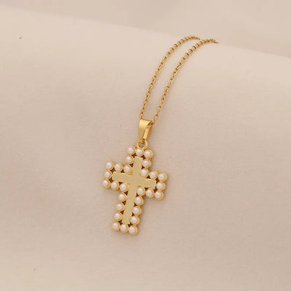 Collar Cruz Dorada con mini Perlas