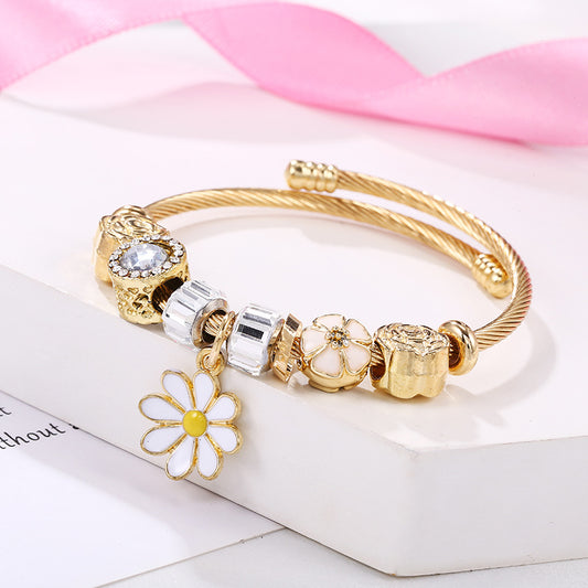 Pulsera Multidijes Margarita Dorada Blanca