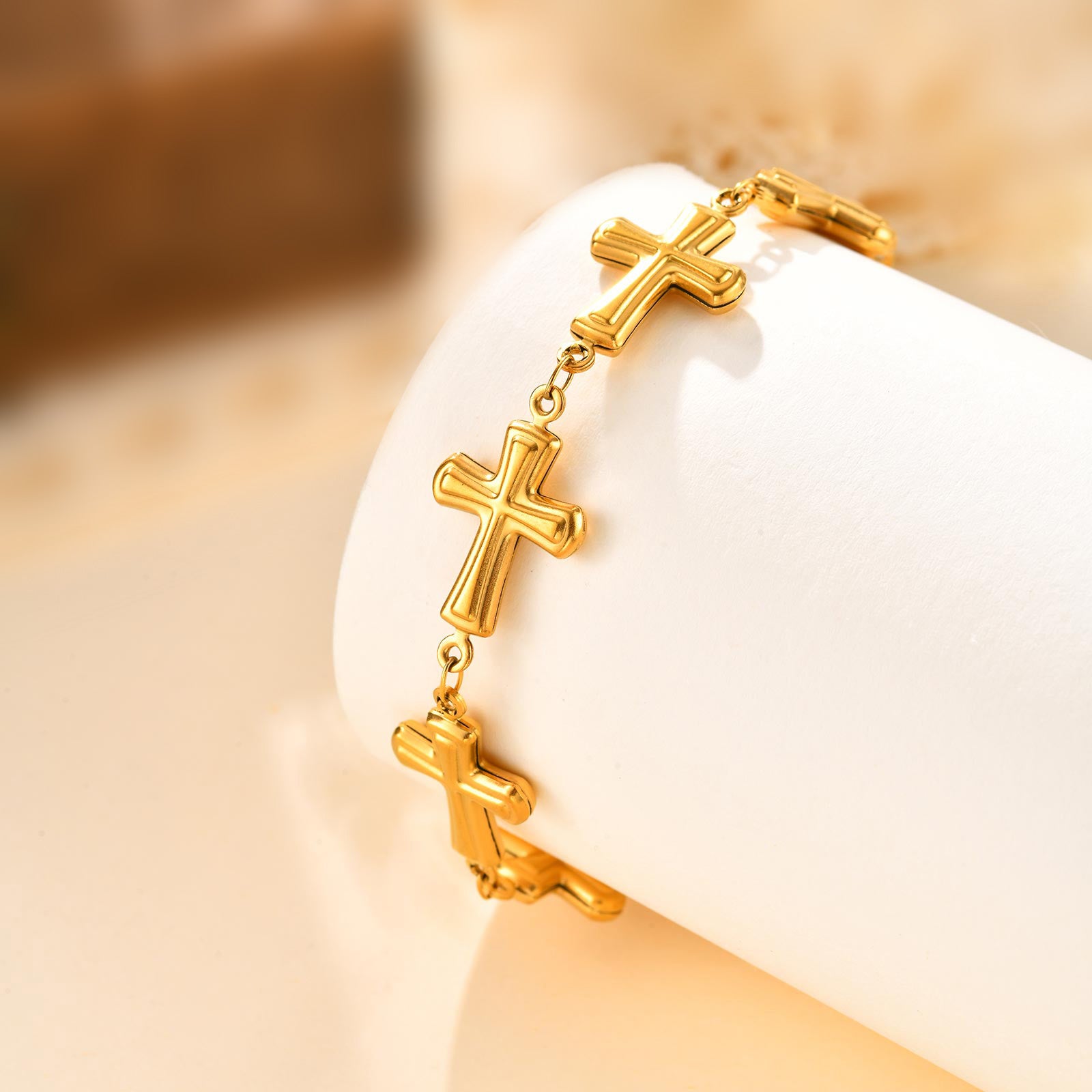 Pulsera dorada cruces