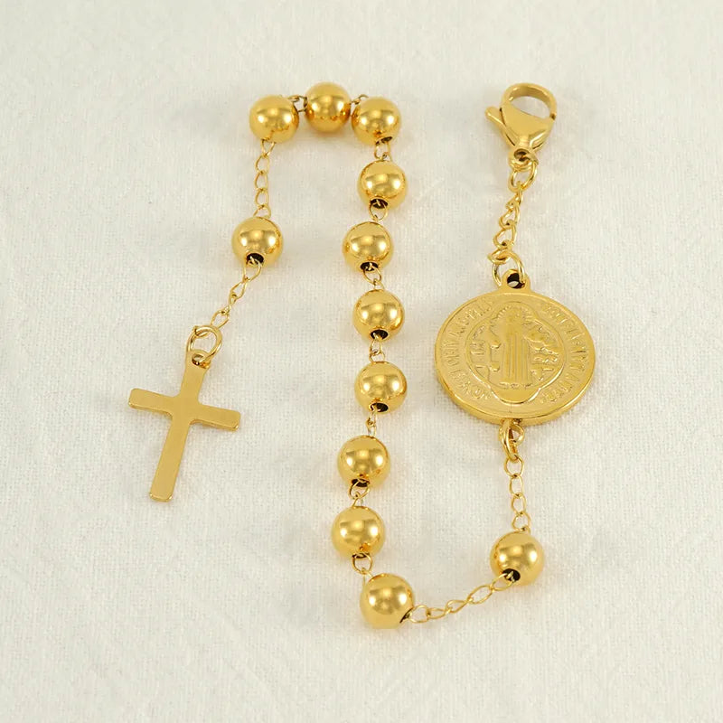 Pulsera de San Benito con cruz dorada