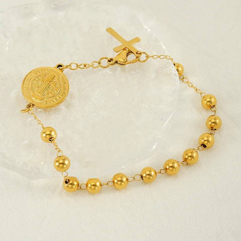 Pulsera de San Benito con cruz dorada